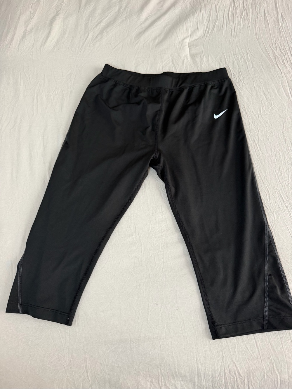 Nike women Black Cropped Athletic Leggings with White Swoosh